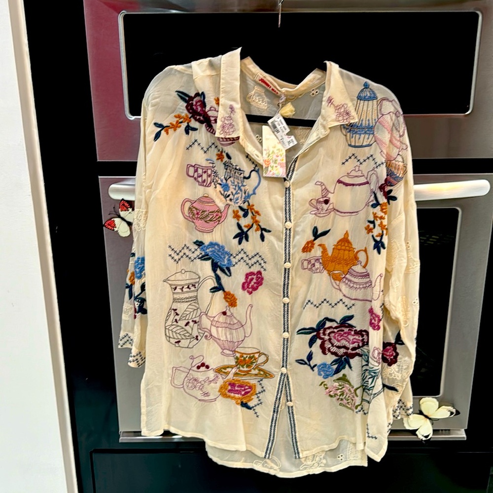 Never worn Johnny was  with tea pots on it